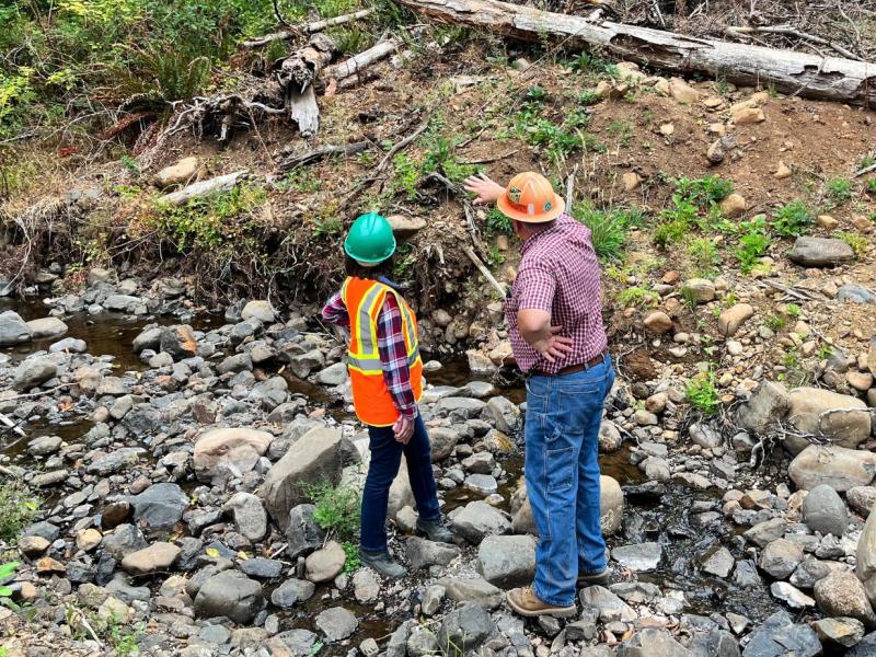 Rep. Salinas surveys a river
