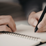 Writing in Notebook