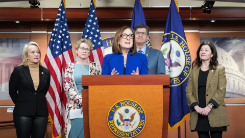 Rep. Salinas Speaking at a Podium 